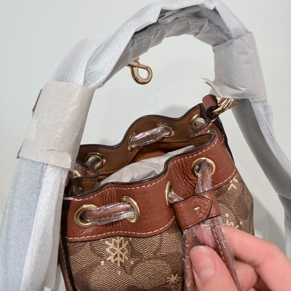 Coach Dempsey Drawstring Bucket Bag 15 In Signature Canvas With Snowflake Print. - Picture 3 of 5